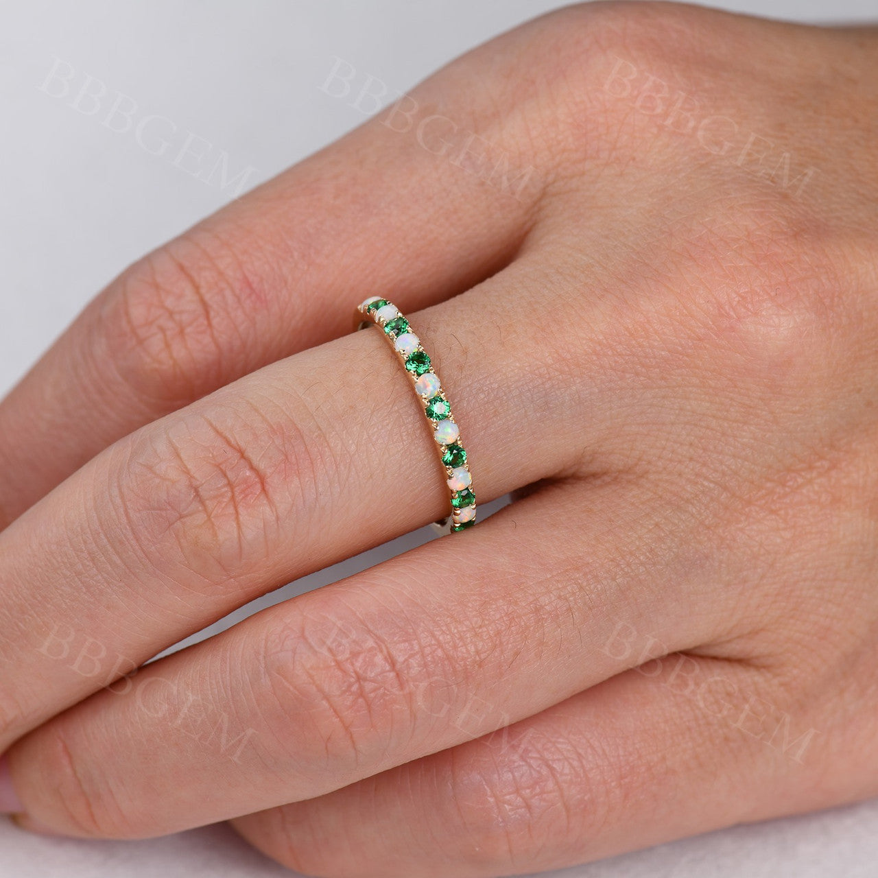 half eternity opal and emerald wedding band