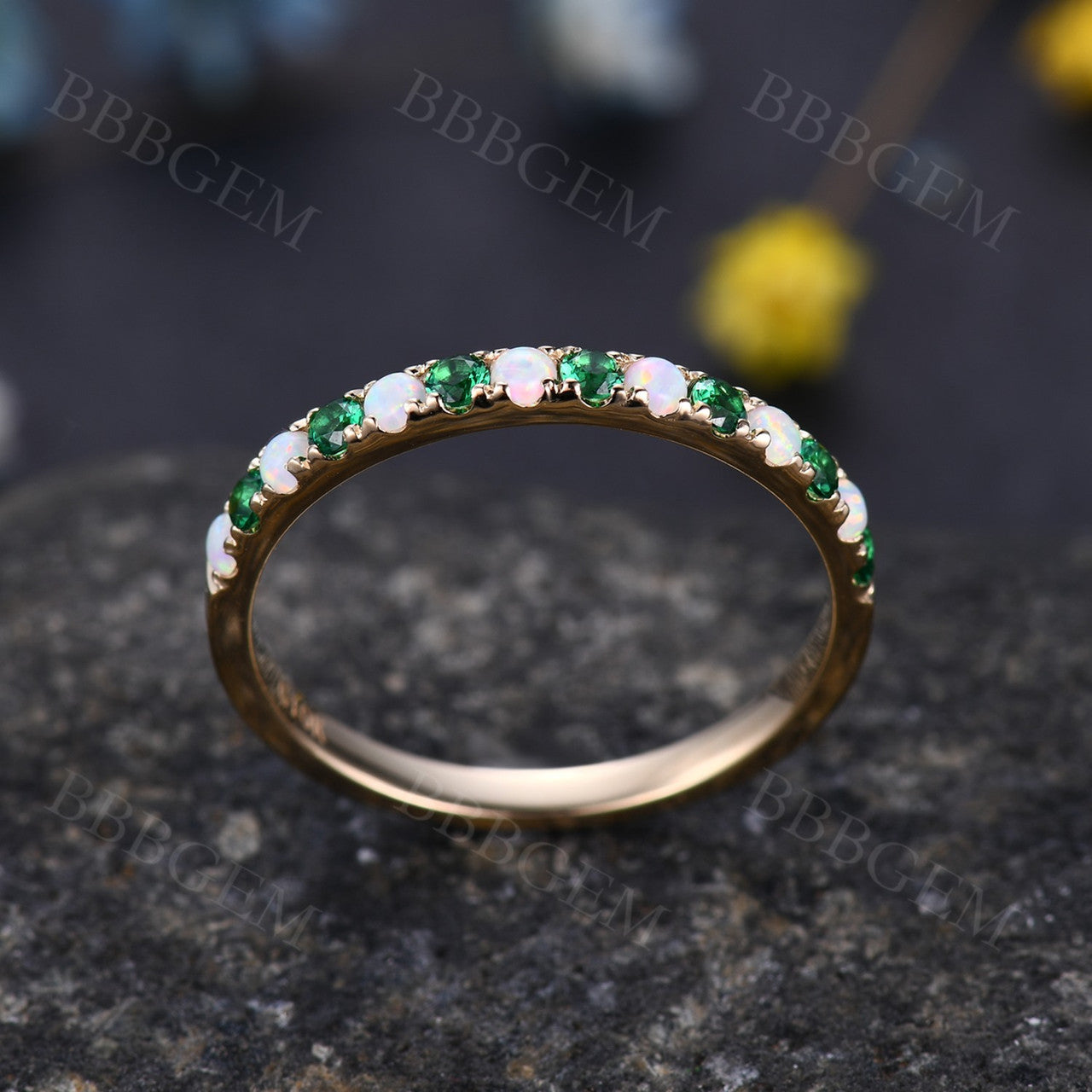yellow gold opal and emerald ring band