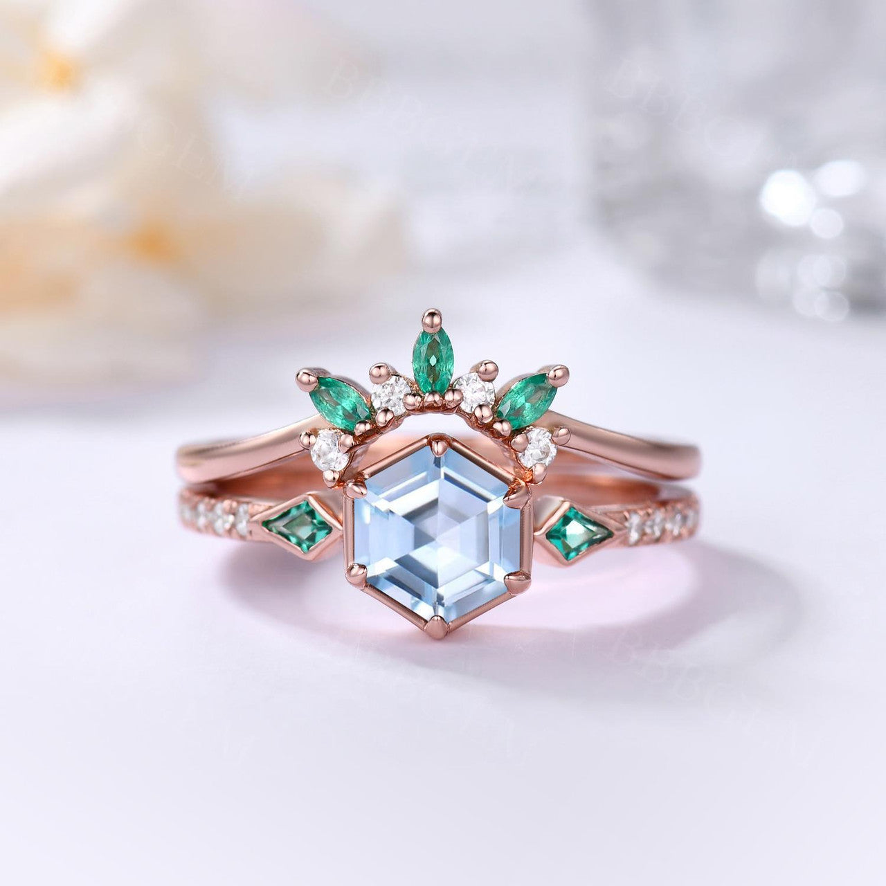 Aquamarine Hexagon Ring Bezel Set with Kite cut lab emerald side stones in rose gold