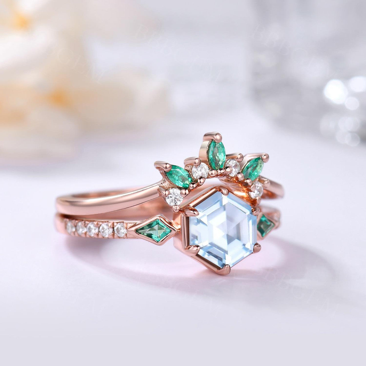 Aquamarine Hexagon Ring Bezel Set with Kite cut lab emerald side stones in rose gold
