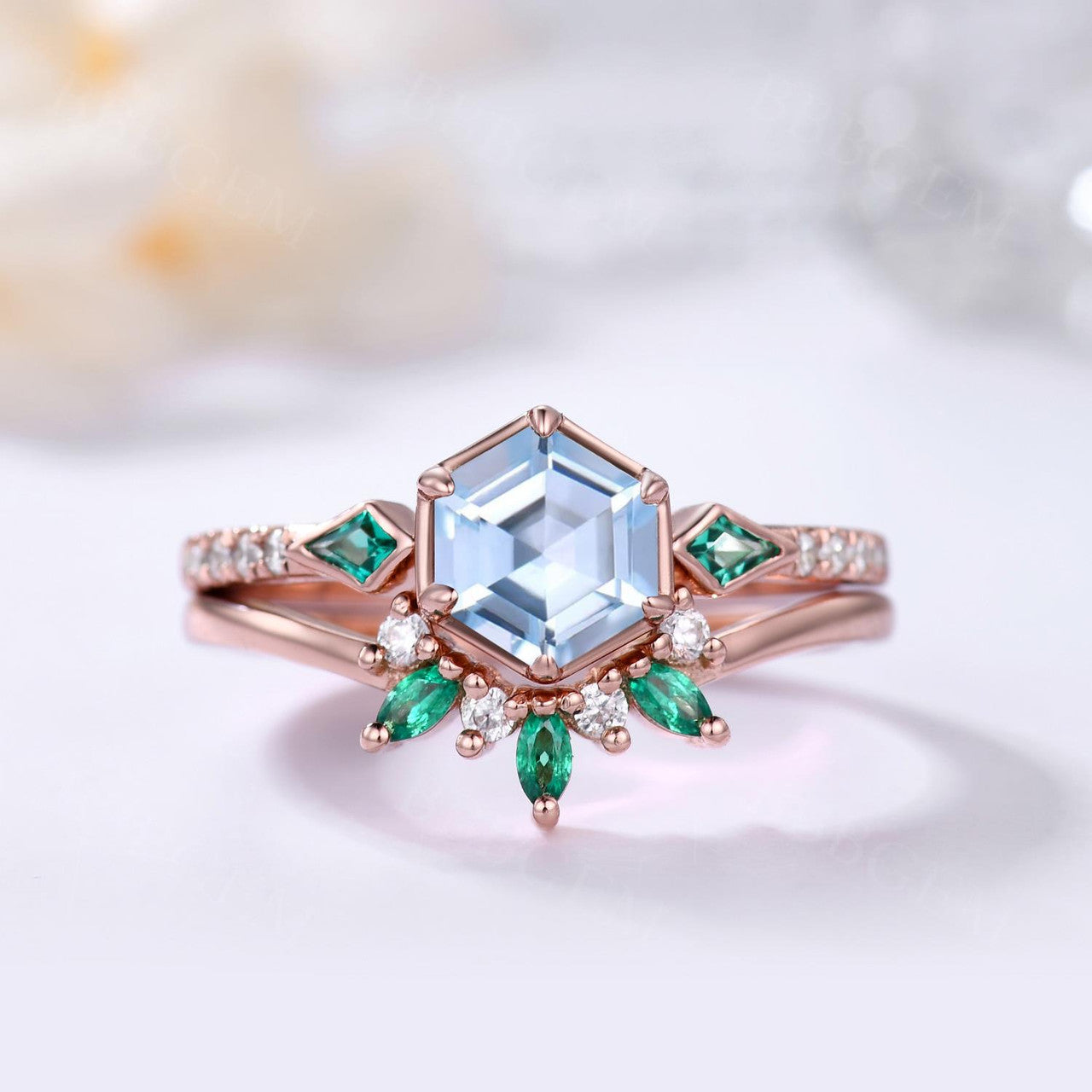 Aquamarine Hexagon Ring Bezel Set with Kite cut lab emerald side stones in rose gold