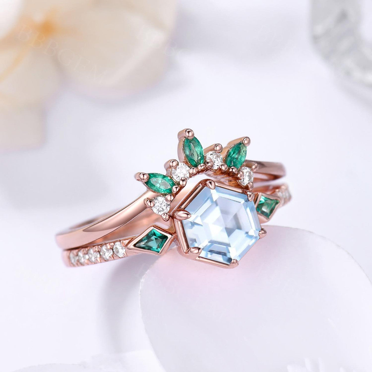 Aquamarine Hexagon Ring Bezel Set with Kite cut lab emerald side stones in rose gold