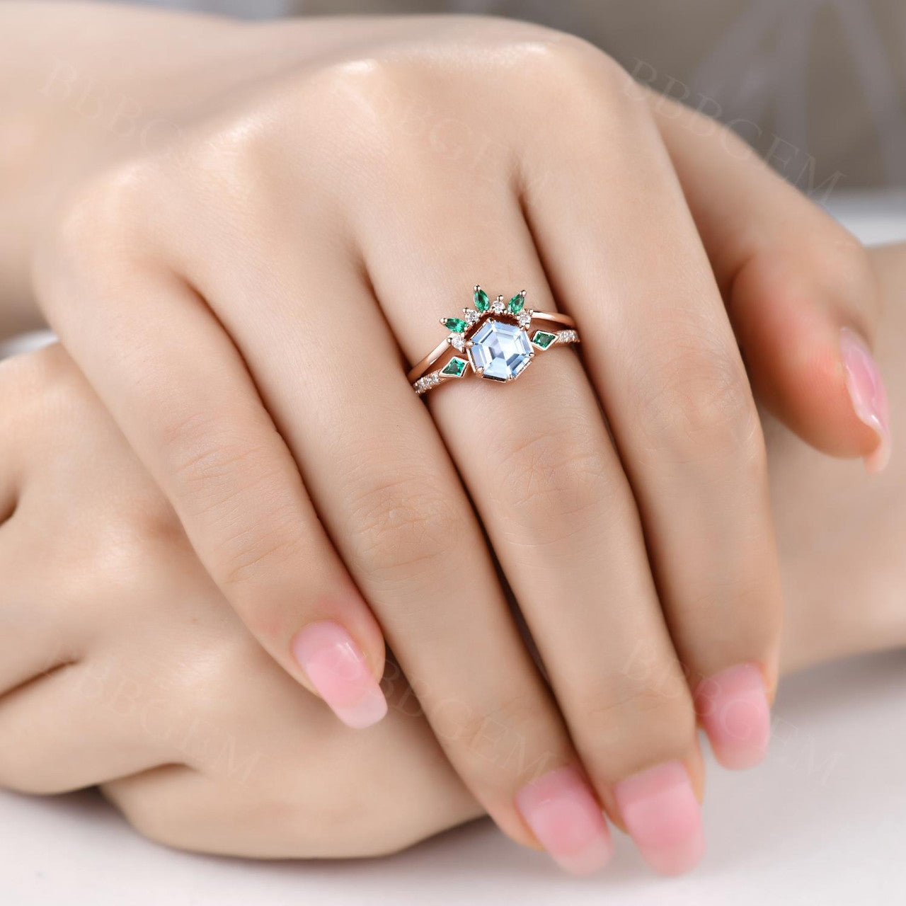 Aquamarine Hexagon Ring Bezel Set with Kite cut lab emerald side stones in rose gold