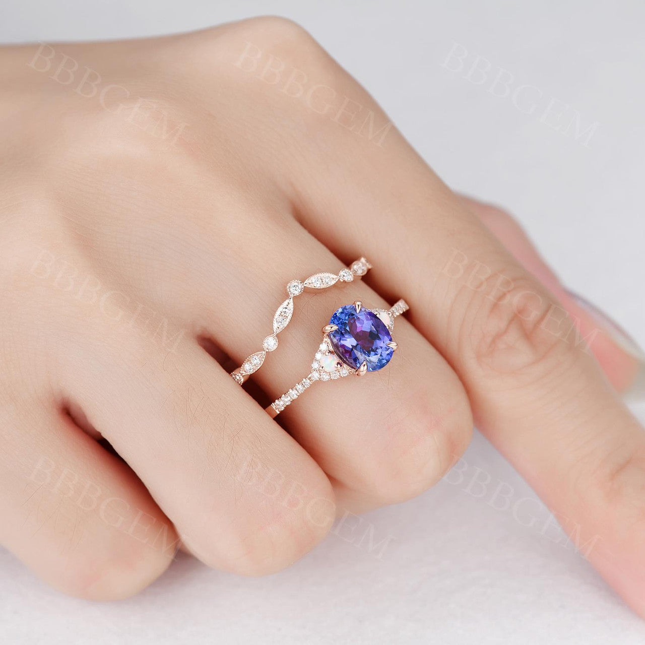 Oval Tanzanite engagement ring rose gold diamond art deco eternity band