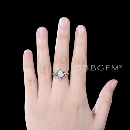 Rose Gold Pear Shaped Opal Engagement Ring Twig Leaf Vine Ring