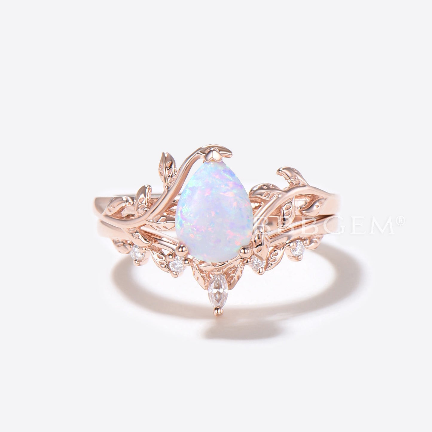 Rose Gold Pear Shaped Opal Engagement Ring Twig Leaf Vine Ring