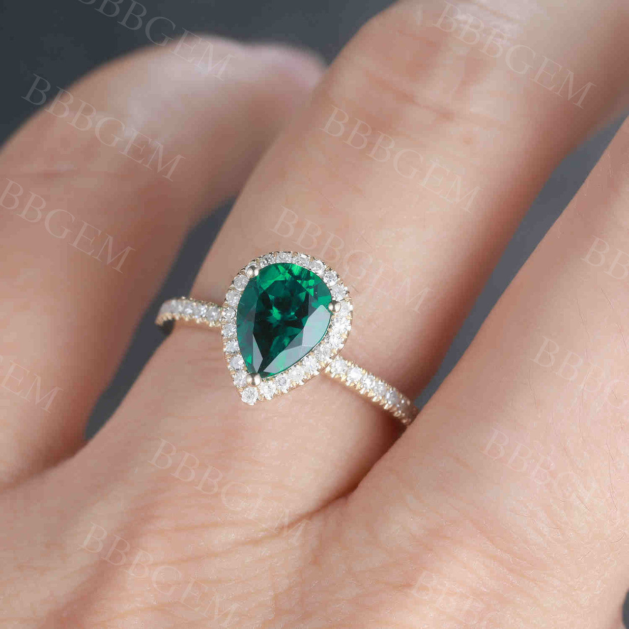 Pear Shaped Emerald Engagement Ring Yellow Gold