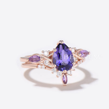 Pear Shaped Purple Sapphire Engagement Ring Twist Shank Ring