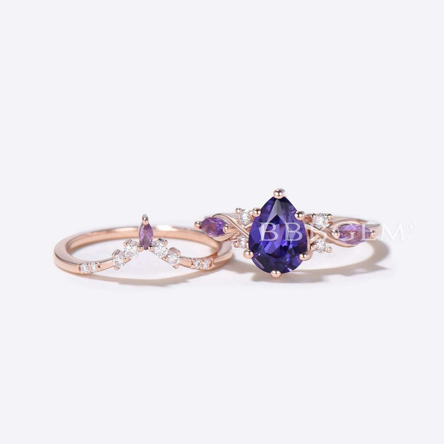 Pear Shaped Purple Sapphire Engagement Ring Twist Shank Ring