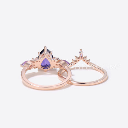 Pear Shaped Purple Sapphire Engagement Ring Twist Shank Ring