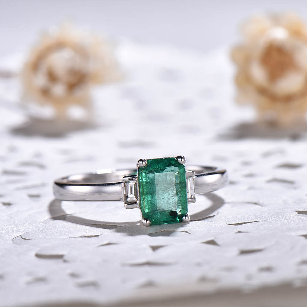 emerald ring with diamond accents