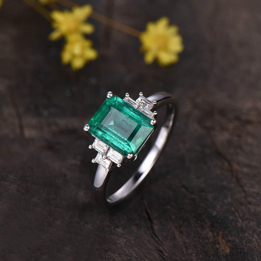 Solitaire Natural Emerald Cut Emerald And Baguette Cut Diamond Engagement Ring