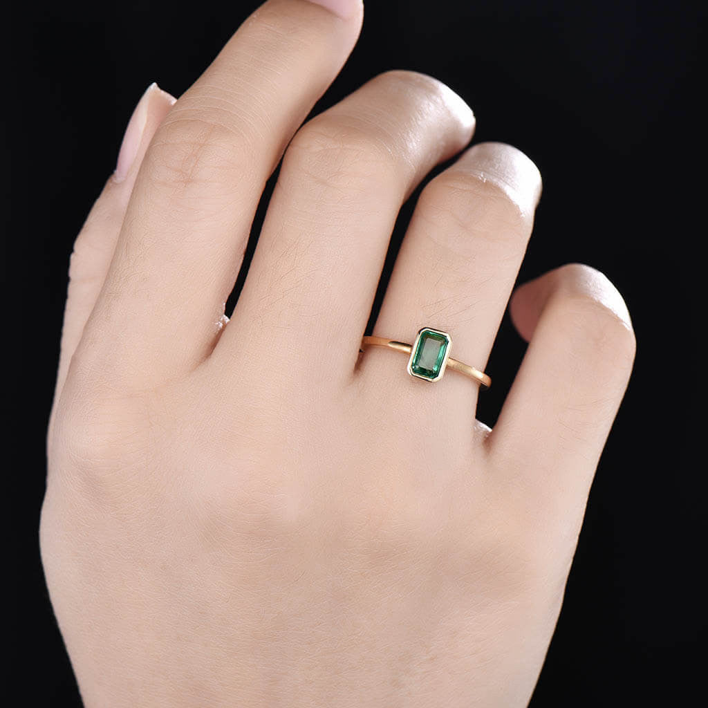 Solitaire Emerald Cut Emerald Engagement Ring 01