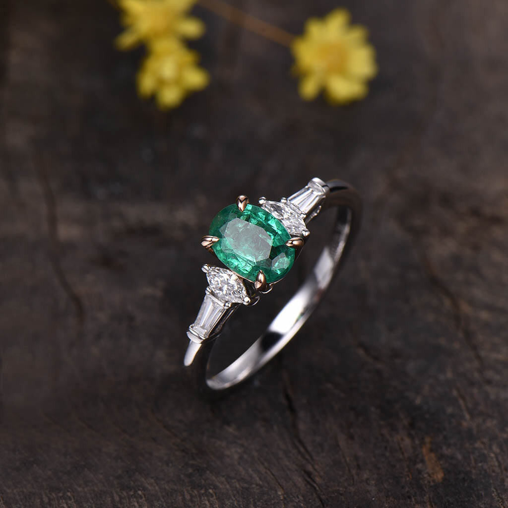 two tone oval  emerald engagement ring 02