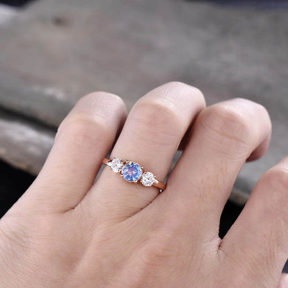 Rainbow Moonstone Engagement Ring Hand