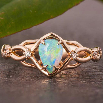 Australian opals Celtic style engagement ring