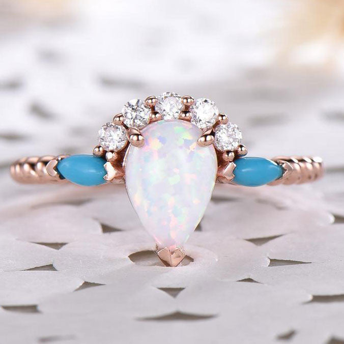 Pear shaped moonstone engagement ring and turquoise