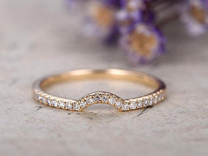 Curved diamond wedding band yellow gold