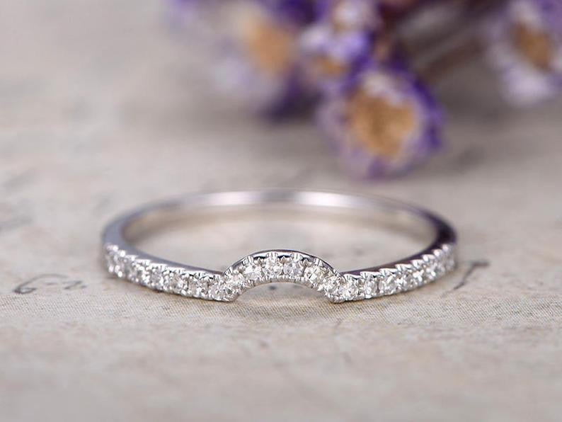 Curved diamond wedding band white gold