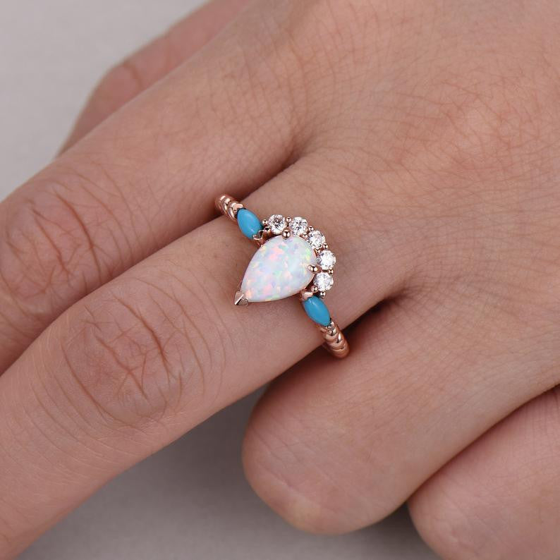 Pear shaped moonstone engagement ring and turquoise