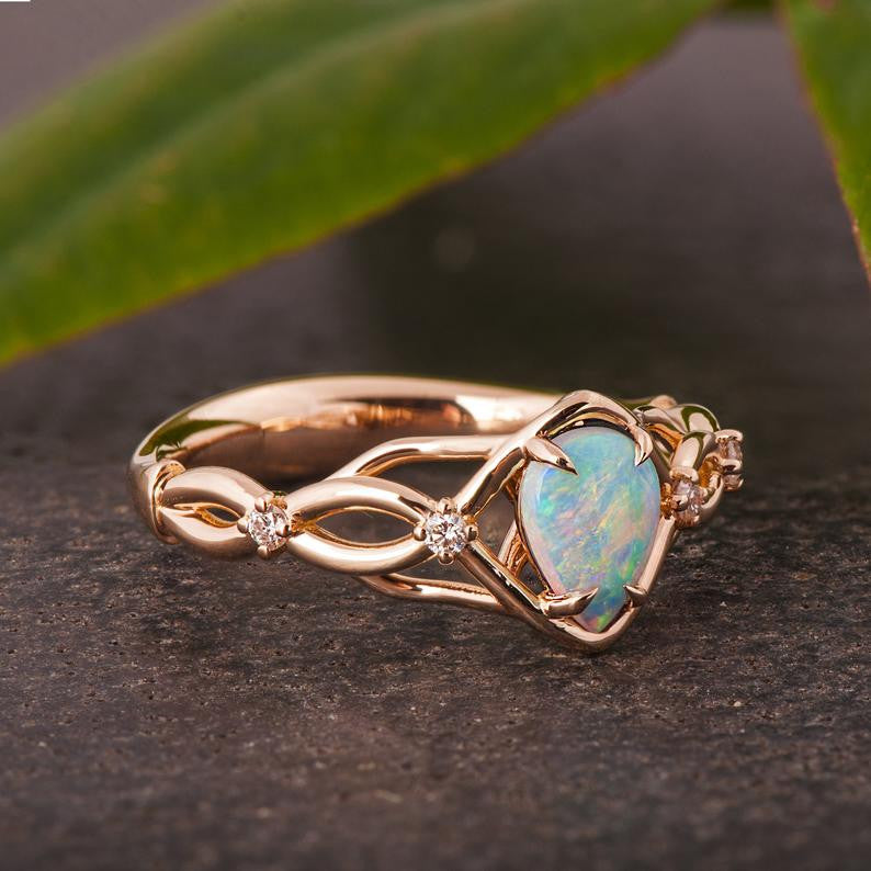 Australian opals Celtic style engagement ring