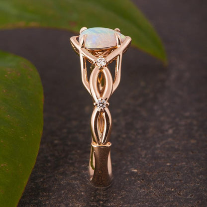 Australian opals Celtic style engagement ring