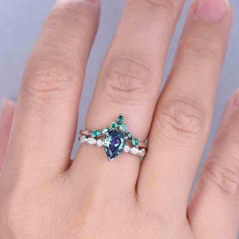 Pear alexandrite diamond ring and emerald wedding band 01