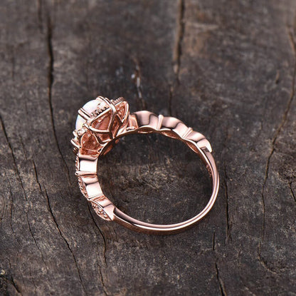 rose gold opal engagement ring
