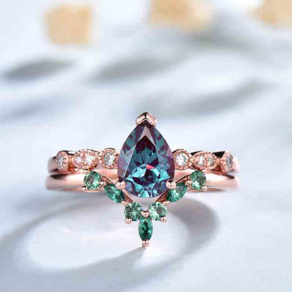 Pear alexandrite diamond ring and emerald wedding band rose gold 0