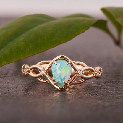 Australian opals Celtic style engagement ring