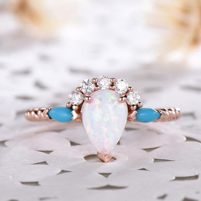 Pear shaped moonstone engagement ring and turquoise