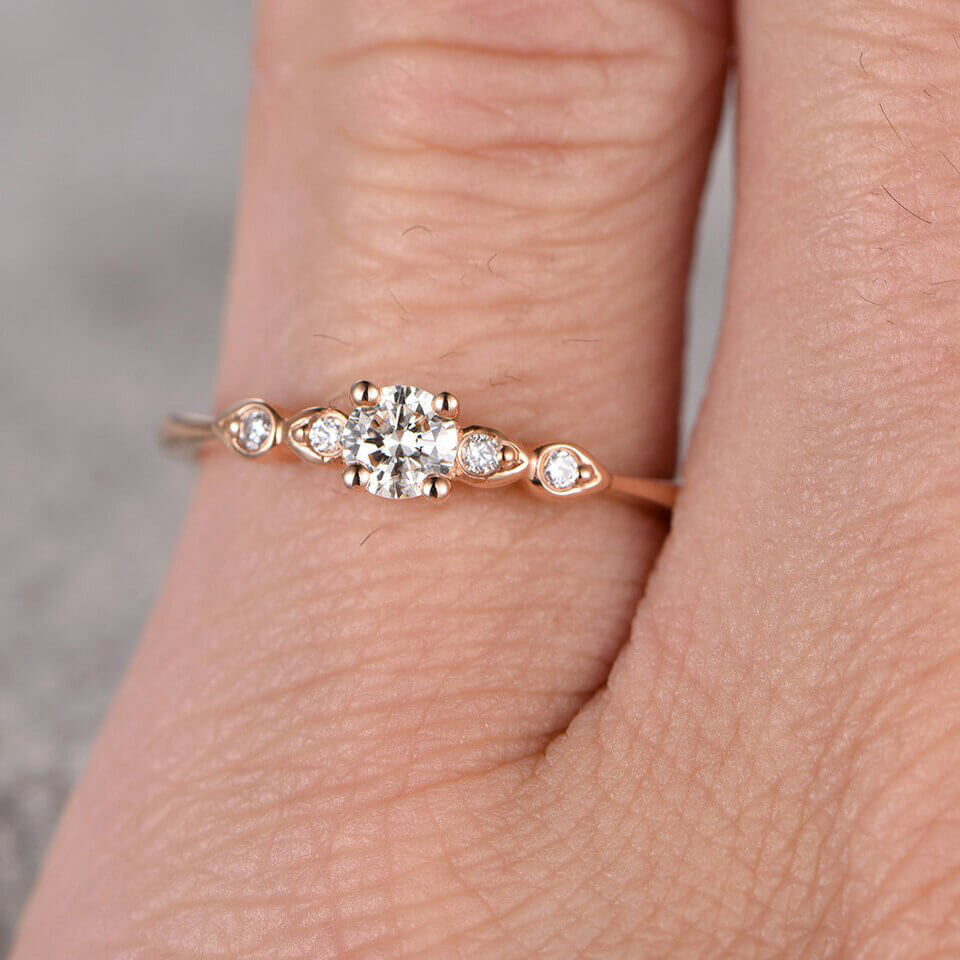 simple moissanite engagement ring round cut 01