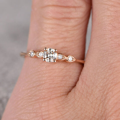 simple moissanite engagement ring round cut 01