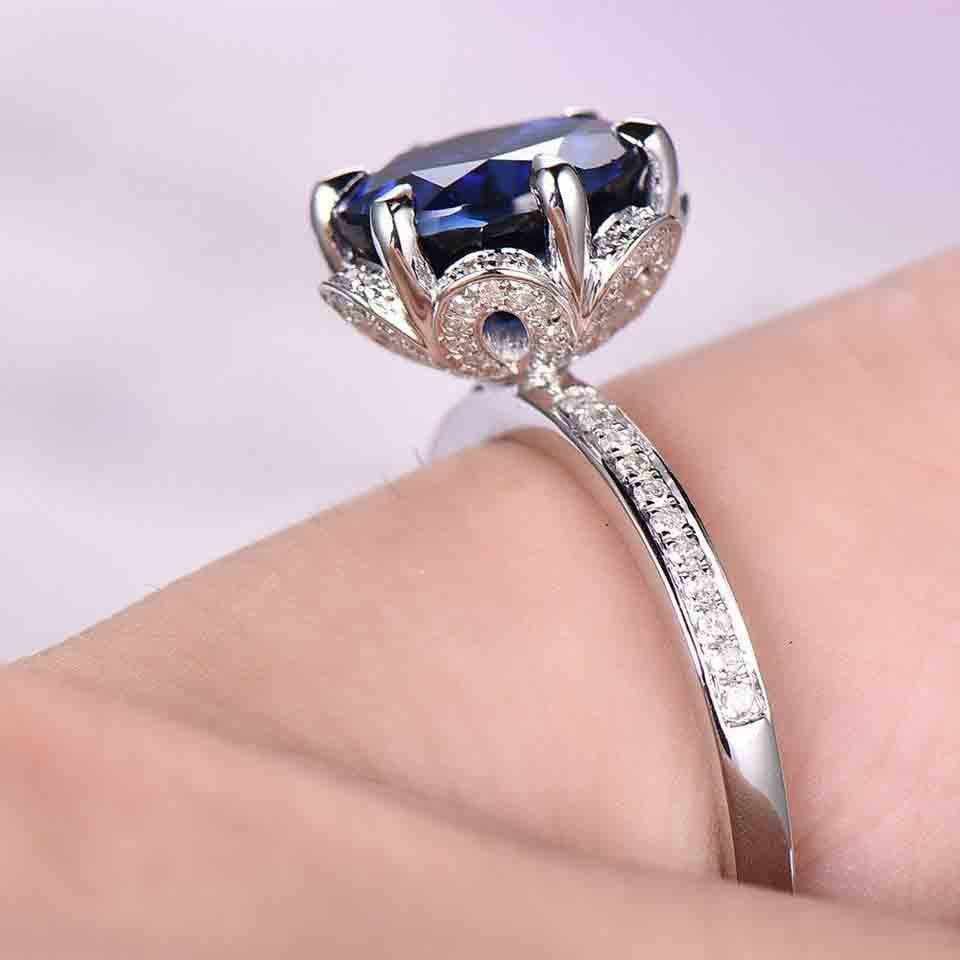 Flower Halo Blue Sapphire Diamond Engagement Ring 01